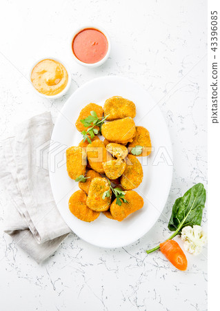 Healthy vegetarian nuggets with carrots, cauliflower and spinach. Vegetable nuggets. Vegan food. Top Healthy vegetarian nuggets with carrots, cauliflower and spinach. Vegetable nuggets. Vegan food. Top 43396085