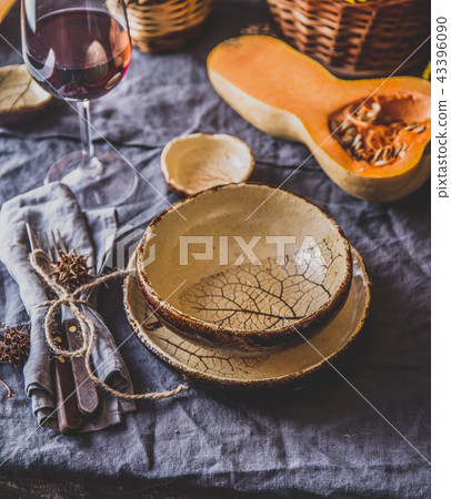 Autumn table setting with pumpkins. Thanksgiving dinner and autumn decoration. Autumn table setting with pumpkins. Thanksgiving dinner and autumn decoration. 43396090