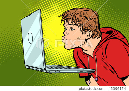 A man kisses the computer screen 43396154