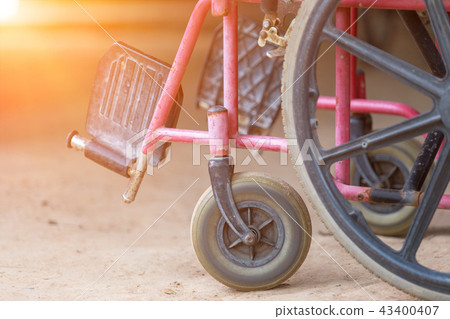 Closed up of old wheel chair. Medical equipment. 43400407