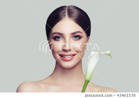 Perfect female face closeup. Young woman  43401576