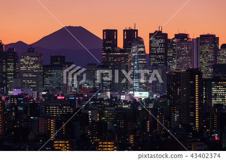 Tokyo Shinjuku group of buildings and sunset view of Mt. Fuji 43402374