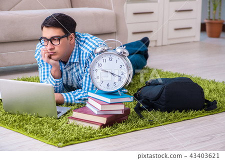 Student having little time to prepare for exams 43403621