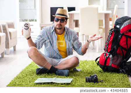 Man planning his travel with map 43404885