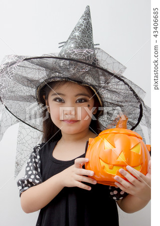 Portrait Asian girl on funny witch clothes Portrait Asian girl on funny witch clothes 43406685