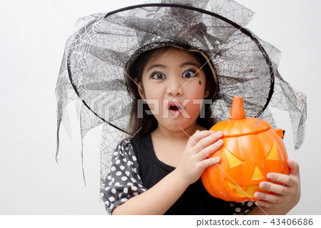 Portrait Asian girl on funny witch clothes Portrait Asian girl on funny witch clothes 43406686