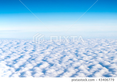 Blue sky and Cloud Top view from airplane window 43406779