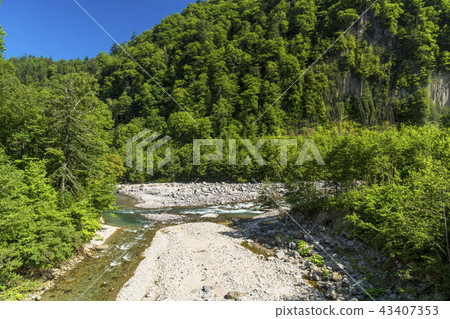 Flow of Chungbetsu River in Tennin Gorge Flow of Chungbetsu River in Tennin Gorge 43407353