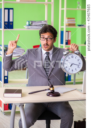 Young handsome lawyer working in the office Young handsome lawyer working in the office 43407685