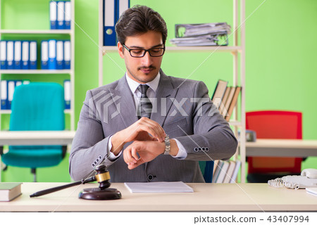 Young handsome lawyer working in the office  43407994