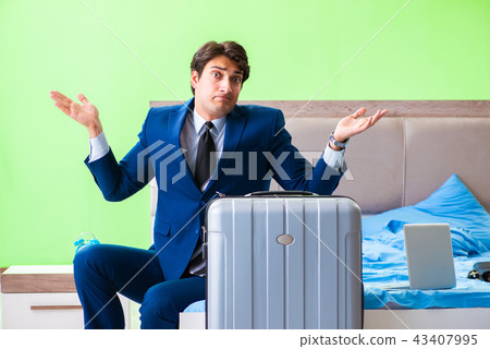 Businessman working in the hotel room 43407995