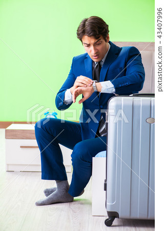 Businessman working in the hotel room Businessman working in the hotel room 43407996