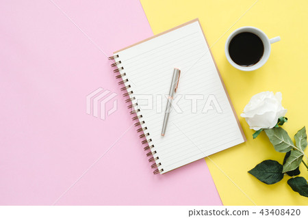 office desk with notebooks, flower, coffee cup. office desk with notebooks, flower, coffee cup. 43408420