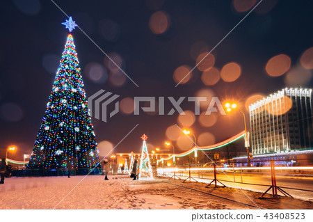Festive Christmas tree in the city Festive Christmas tree in the city 43408523