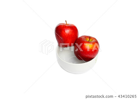 apple red  two in bowl and water drip on white 43410265