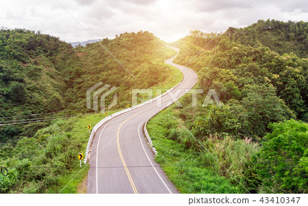Asphalt curved highway on mountain Asphalt curved highway on mountain 43410347