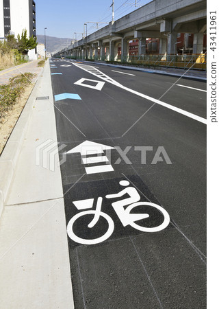 Truck on the left side of the bicycle 43411961