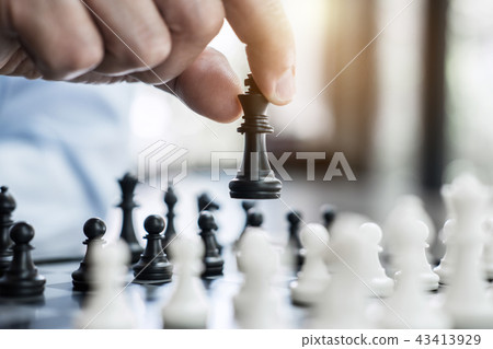 Businessman`s Hand Playing Chess Game To Development Analysis Ne Stock  Photo - Image of competition, business: 123928716