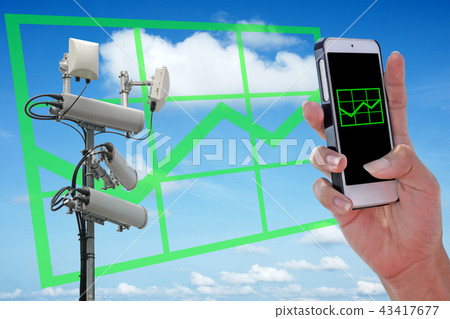 Green rising graph chart showing on smartphone Green rising graph chart showing on smartphone 43417677
