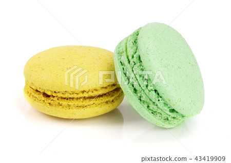 yellow and green macaroon isolated on white background closeup yellow and green macaroon isolated on white background closeup 43419909