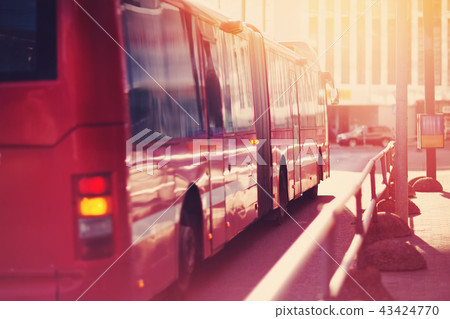 Bus moving on the road in city in early morning 43424770