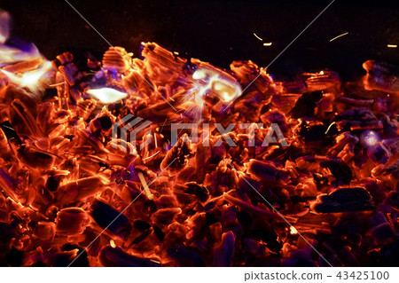 Burning firewood in the fireplace close up, BBQ fire, charcoal background. Burning firewood in the fireplace close up, BBQ fire, charcoal background. 43425100