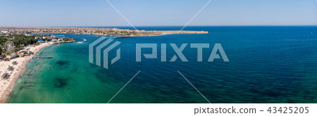 Beautiful aerial view on town off the coast. Sunrise Beautiful aerial view on town off the coast. Sunrise 43425205