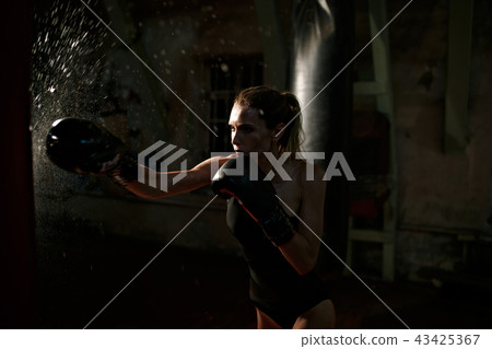 Boxing woman in black body Boxing woman in black body 43425367