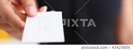 businesswoman give her business card to her new partner closeup businesswoman give her business card to her new partner closeup 43425689