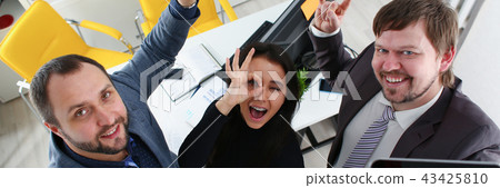 portrait of cheerful young businessmen in office portrait of cheerful young businessmen in office 43425810