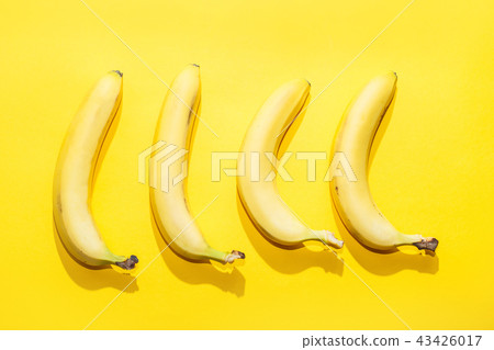 Bananas on yellow pastel background. minimal idea food concept 43426017