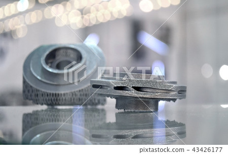 Selective Laser Melting. Object printed on metal 3d printer close-up. 43426177