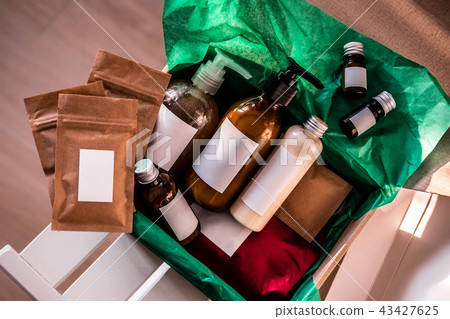 Beauty box with bottles of natural cosmetics 43427625