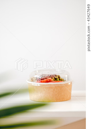 Take away salad in disposable paper bowl Take away salad in disposable paper bowl 43427649