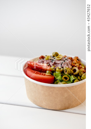 Take away salad in disposable paper bowl Take away salad in disposable paper bowl 43427652