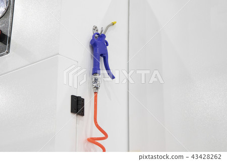 a blue air blow gun for industrial machine 43428262