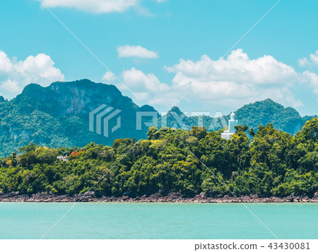 Beautiful tropical sea ocean with white cloud on blue sky background Beautiful tropical sea ocean with white cloud on blue sky background 43430081