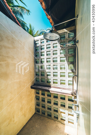 Outdoor shower and bathroom interior Outdoor shower and bathroom interior 43430996