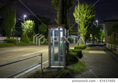 Public phone at night 43433989