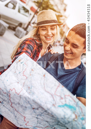Cheerful couple with having fun on street 43434318