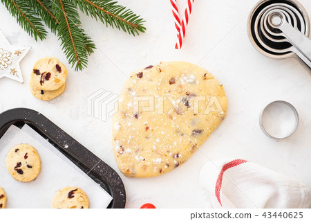 Christmas cookies with nuts and cranberries. Christmas decoration. Top view. Copy space. Christmas cookies with nuts and cranberries. Christmas decoration. Top view. Copy space. 43440625