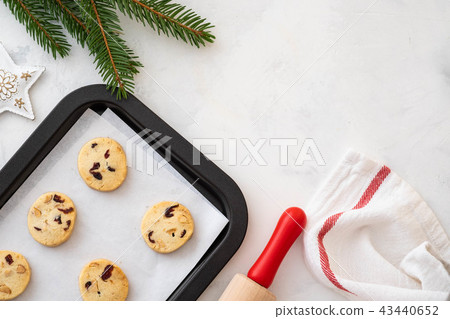 Christmas cookies with nuts and cranberries. Christmas decoration. Top view. Copy space. Christmas cookies with nuts and cranberries. Christmas decoration. Top view. Copy space. 43440652