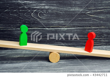 wooden figures of people. rivals in business wooden figures of people. rivals in business 43442711