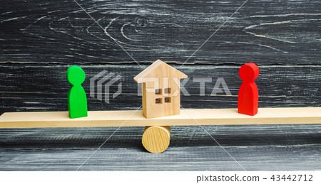 wooden figures on the scales. clarification wooden figures on the scales. clarification 43442712