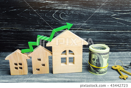 Wooden houses stand in a row from small to  43442723