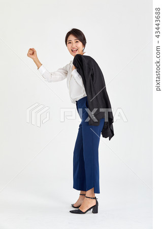 20s, 30s business woman holding a fist and fighting, departure, bag, fighting, fighting 43443688