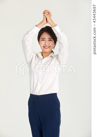 20s, 30s business woman holding a fist and fighting, departure, bag, fighting, fighting 43443697