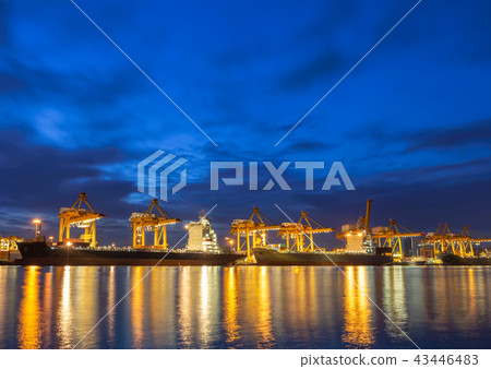 Sea ship at dock with working crane lift container Sea ship at dock with working crane lift container 43446483