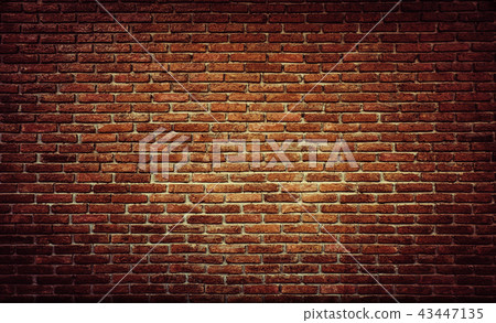 empty room with red brick wall and wooden floor 43447135