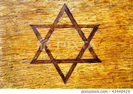 Jewish symbol star of David inlayed on vintage wooden casket side Jewish symbol star of David inlayed on vintage wooden casket side 43448429
